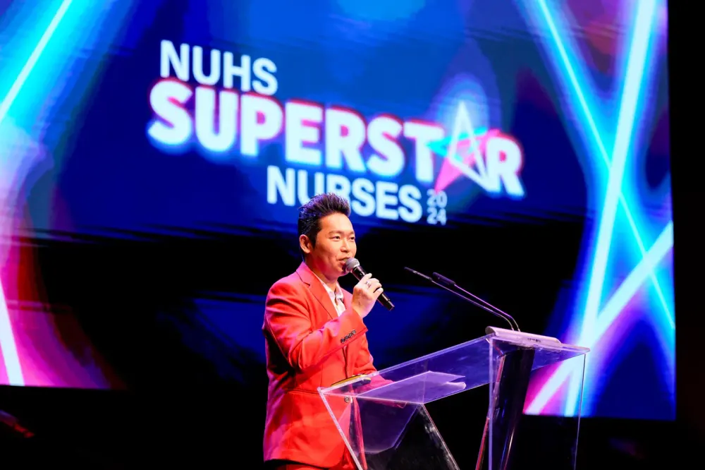 James Yang hosting the NUHS Superstar Nurses award ceremony in 2024